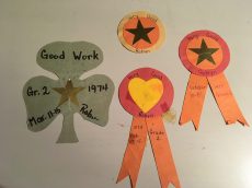 Four of the five badges.